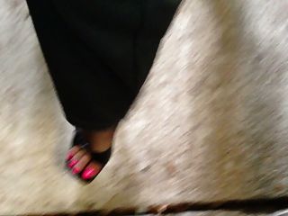 Pink Toenails And Black Stockings With Mules