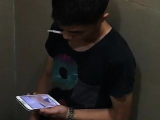 Asian Boy Caught Jerking And Cumming At The Restroom